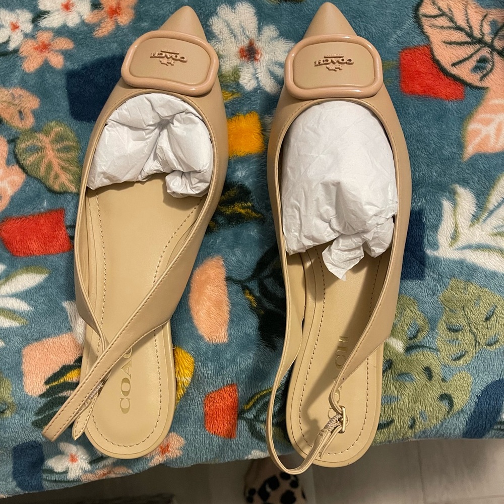 Coach slingback flats.